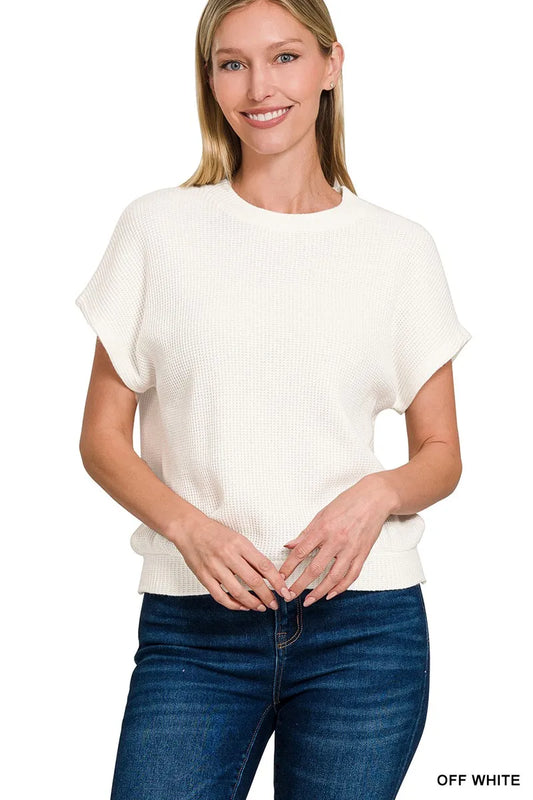 Zenana short sleeve sweater with round neck, banded hem, and button detail in a cozy knit fabric.