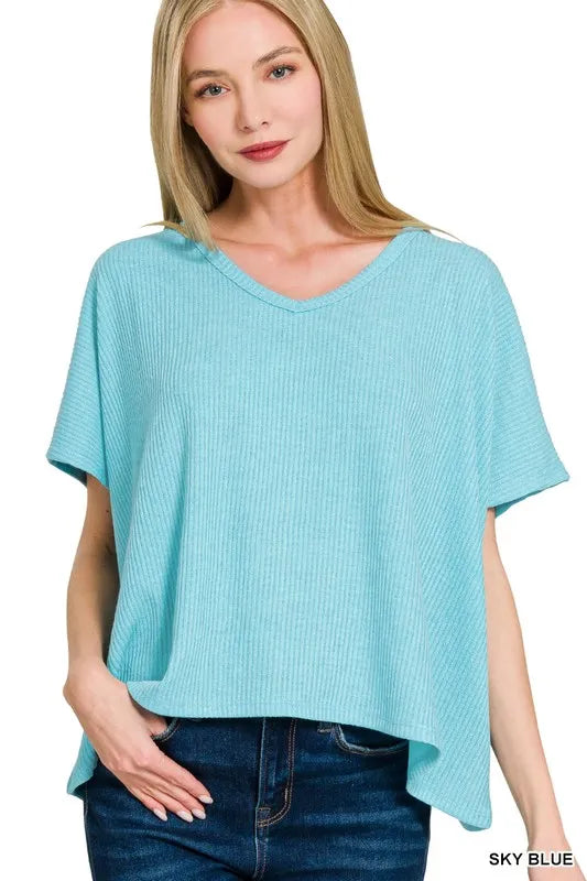 Zenana ribbed V-neck short-sleeve knit top, stylish and comfortable women’s casual top with a fitted ribbed design.