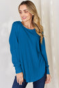 Basic Bae ribbed round neck slit T-shirt by Trendsi, showcasing a full-size, casual design with ribbed fabric and a relaxed fit.