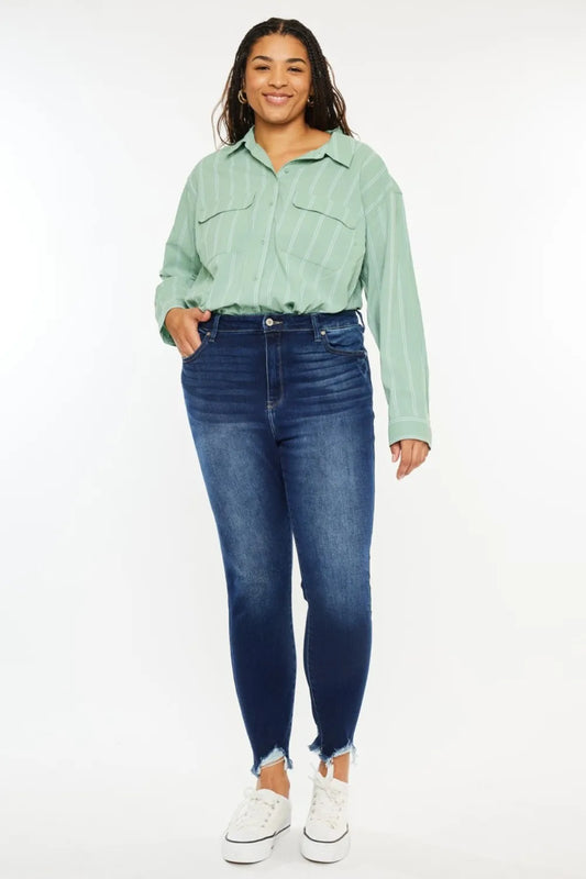 Kancan high-rise frayed ankle skinny jeans from Trendsi, showing the distressed hem and fitted denim style.