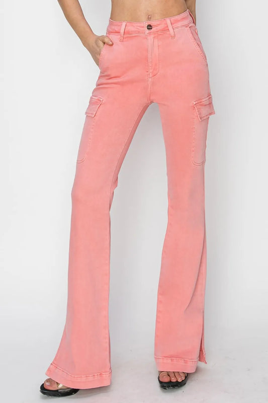 Risen high rise cargo bootcut jeans with side slits, featuring a relaxed fit and classic denim look, styled on a model.