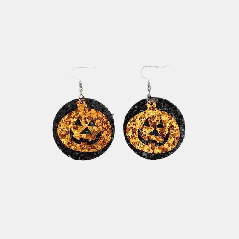 Trendsi PU leather pumpkin earrings featuring orange pumpkin-shaped charms with gold-tone accents, perfect for fall accessories.