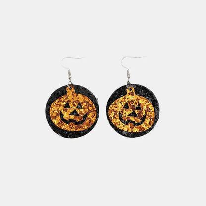 Trendsi PU leather pumpkin earrings featuring orange pumpkin-shaped charms with gold-tone accents, perfect for fall accessories.