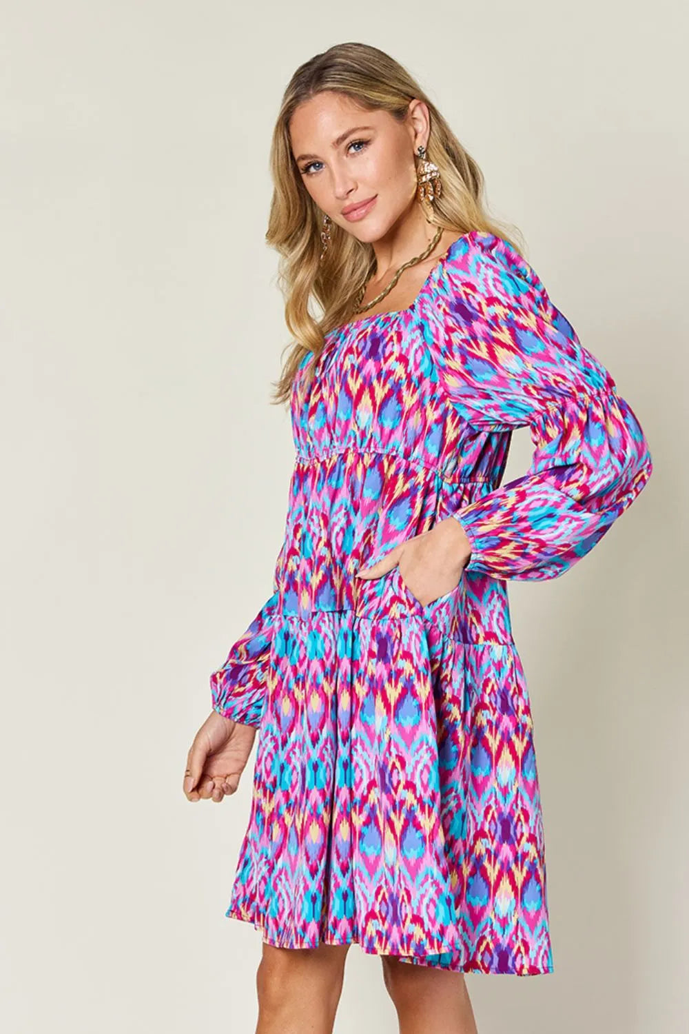 Printed long sleeve dress by Trendsi, Double Take full size, featuring a stylish design and comfortable fit.