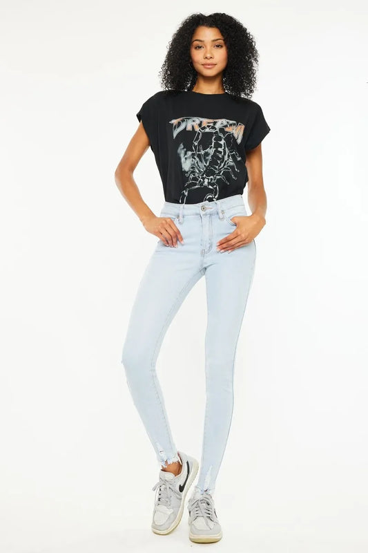 Kancan high rise super skinny jeans in dark wash, fitted style, with front pockets and belt loops, on a model.