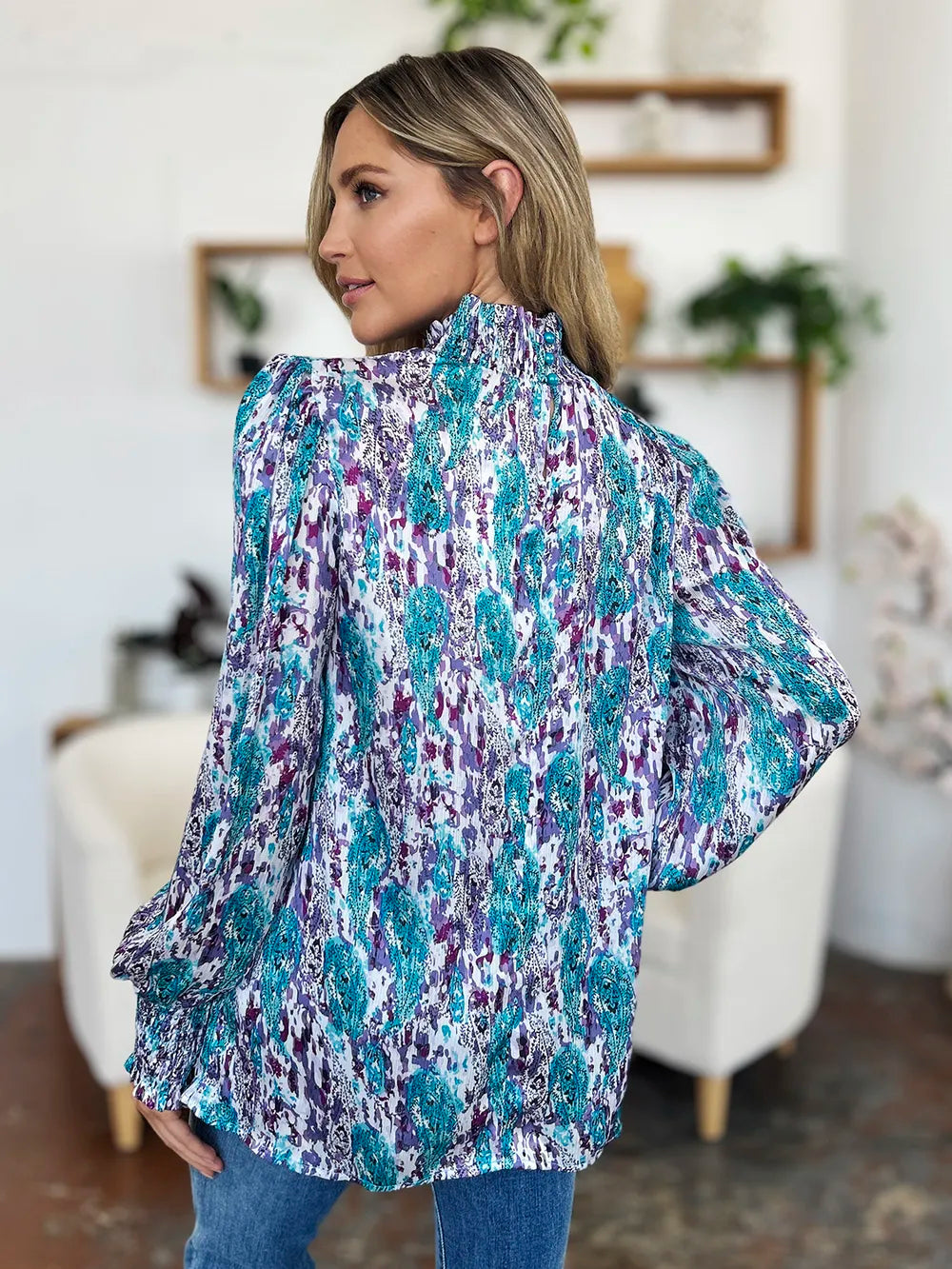 Printed smocked long sleeve blouse from Trendsi featuring a double take full size design with stylish details