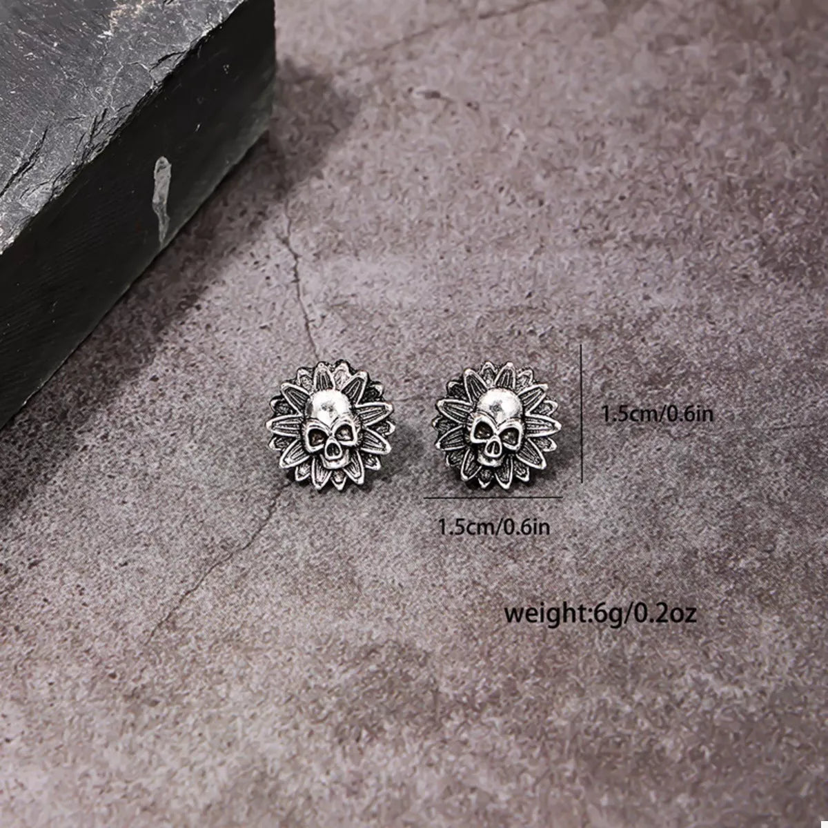 Halloween Skull Sunflower Stud Earrings by Trendsi, featuring spooky skulls and vibrant sunflower designs in a close-up view.