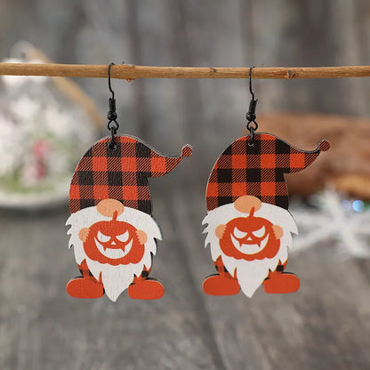 Wooden Dwarfs Pumpkin Dangle Earrings from Trendsi featuring carved pumpkin and dwarf designs on natural wood earrings.