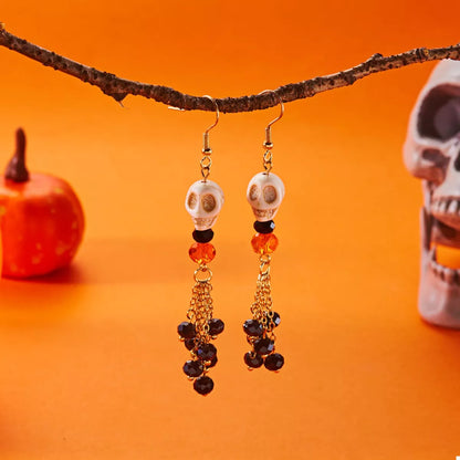 Halloween Skull Beaded Drop Earrings featuring black beads and silver-tone skull charms, stylish jewelry for spooky occasions.