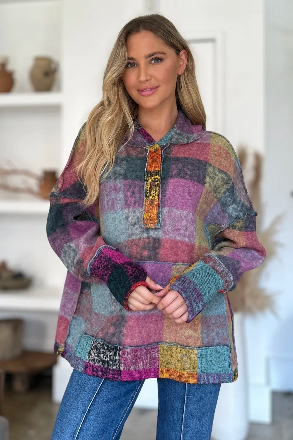 Plus size plaid fleece hoodie with dropped shoulders from Trendsi, featuring a cozy, casual fit and full-size design.