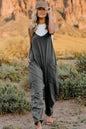 Trendsi Double Take full size sleeveless V-neck jumpsuit with pockets, showcasing its stylish design and comfortable fit.