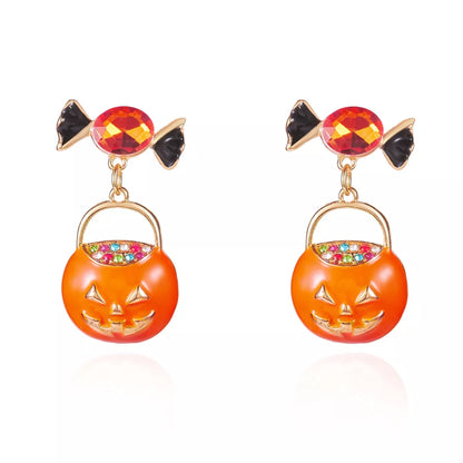 Halloween Rhinestone Pumpkin Dangle Earrings featuring sparkling rhinestones and pumpkin design, perfect for festive fall accessories.
