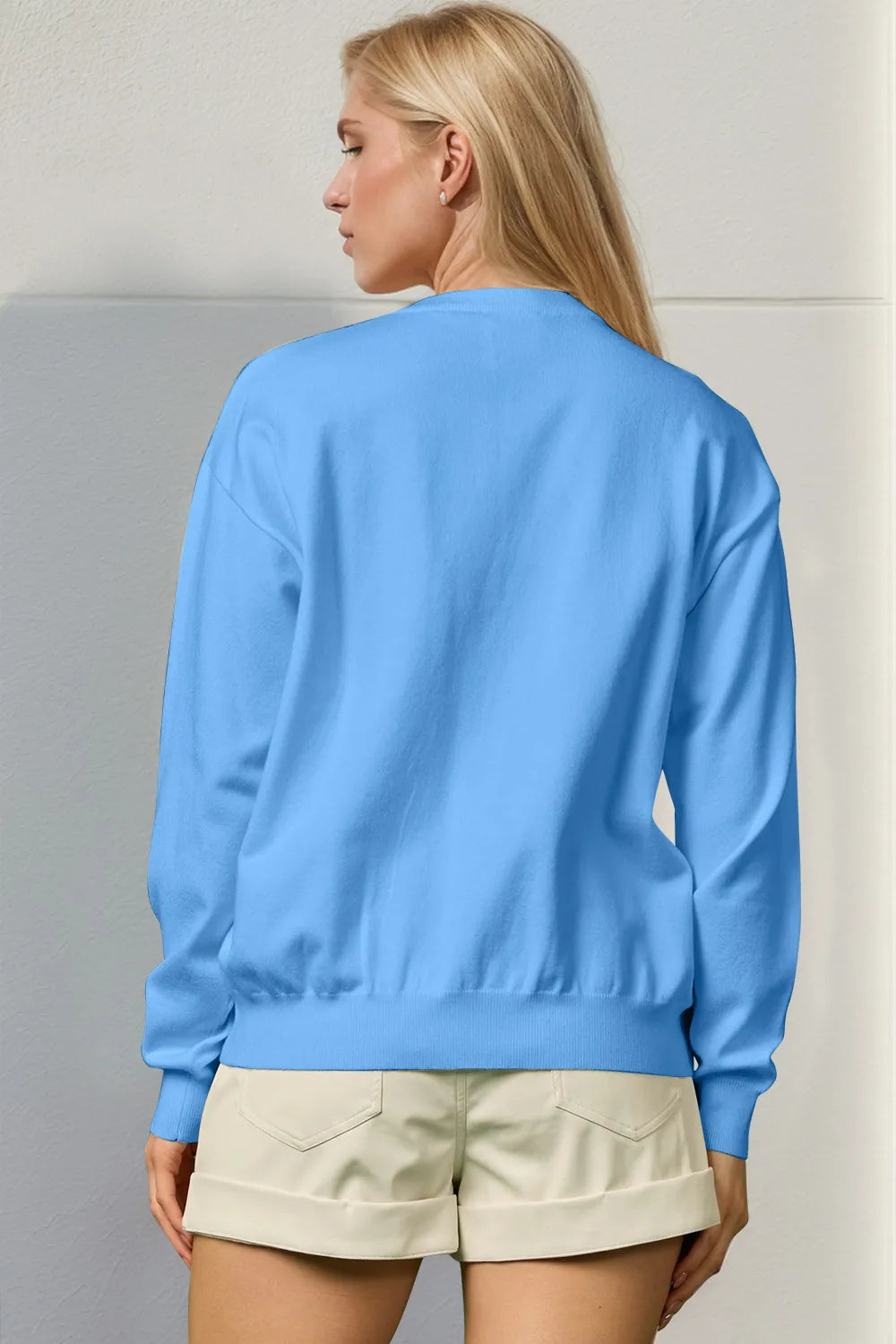 Trendsi Double Take full size sequin Nutcracker long sleeve sweater featuring festive holiday design and sparkly sequin embellishments.