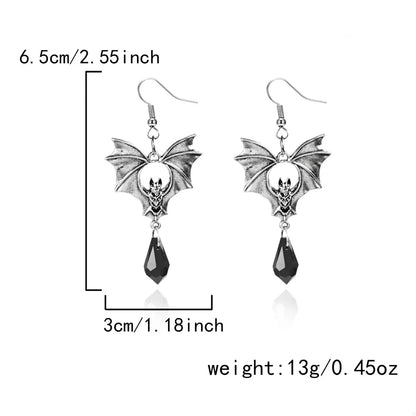 Gothic Bat Drop Earrings with black bat-shaped charms hanging from silver hooks, stylish jewelry for gothic fashion.