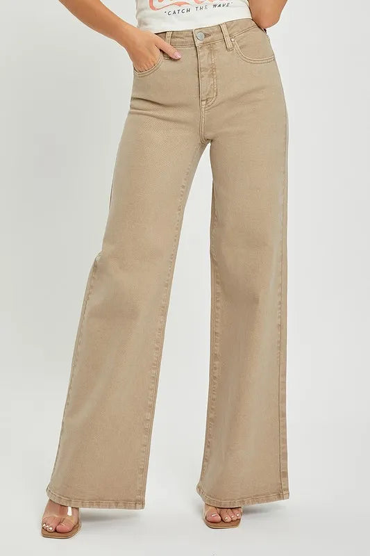 Plus size RISEN high rise wide leg jeans with tummy control, featuring a full size fit and trendy denim style.