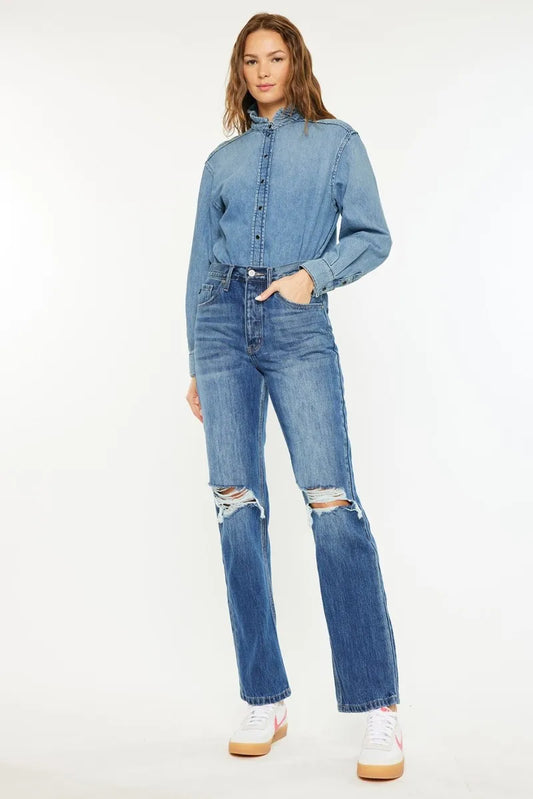 Kancan ultra high rise 90's boyfriend jeans in light wash denim with relaxed fit and distressed details, styled with a casual top.