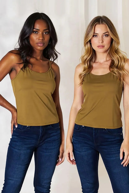 Plus size basic Bae full-size round neck slim cami by Trendsi, shown in black on a model, highlighting its fitted, sleeveless design.