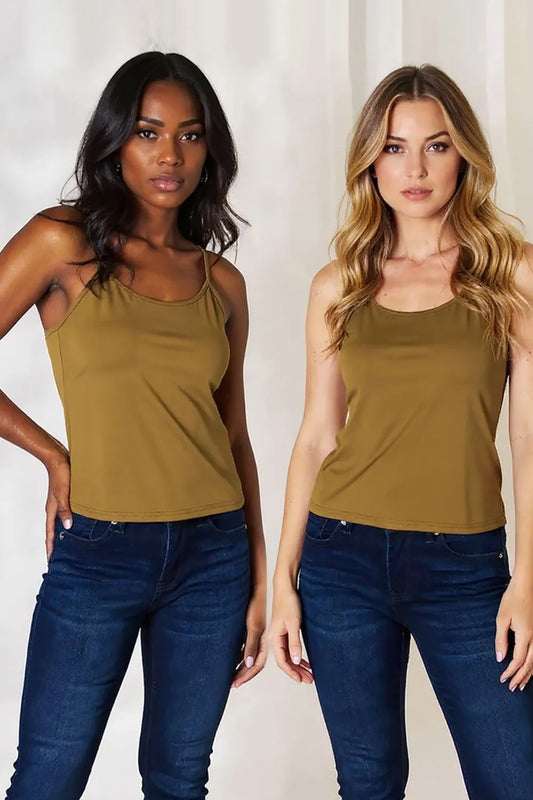 Plus size basic Bae full-size round neck slim cami by Trendsi, shown in black on a model, highlighting its fitted, sleeveless design.