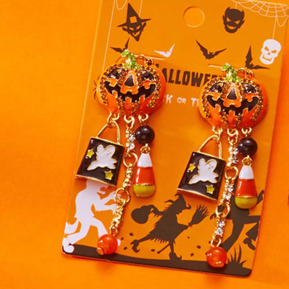 Halloween pumpkin drop earrings featuring orange and black pumpkin charms, perfect for spooky seasonal accessories.