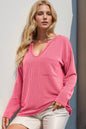 Trendsi Double Take striped long sleeve T-shirt with notched neckline, featuring black and white horizontal stripes.