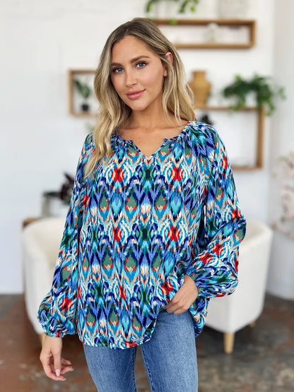 Printed balloon sleeve blouse from Trendsi featuring a double take full size design with bold print and stylish balloon sleeves.