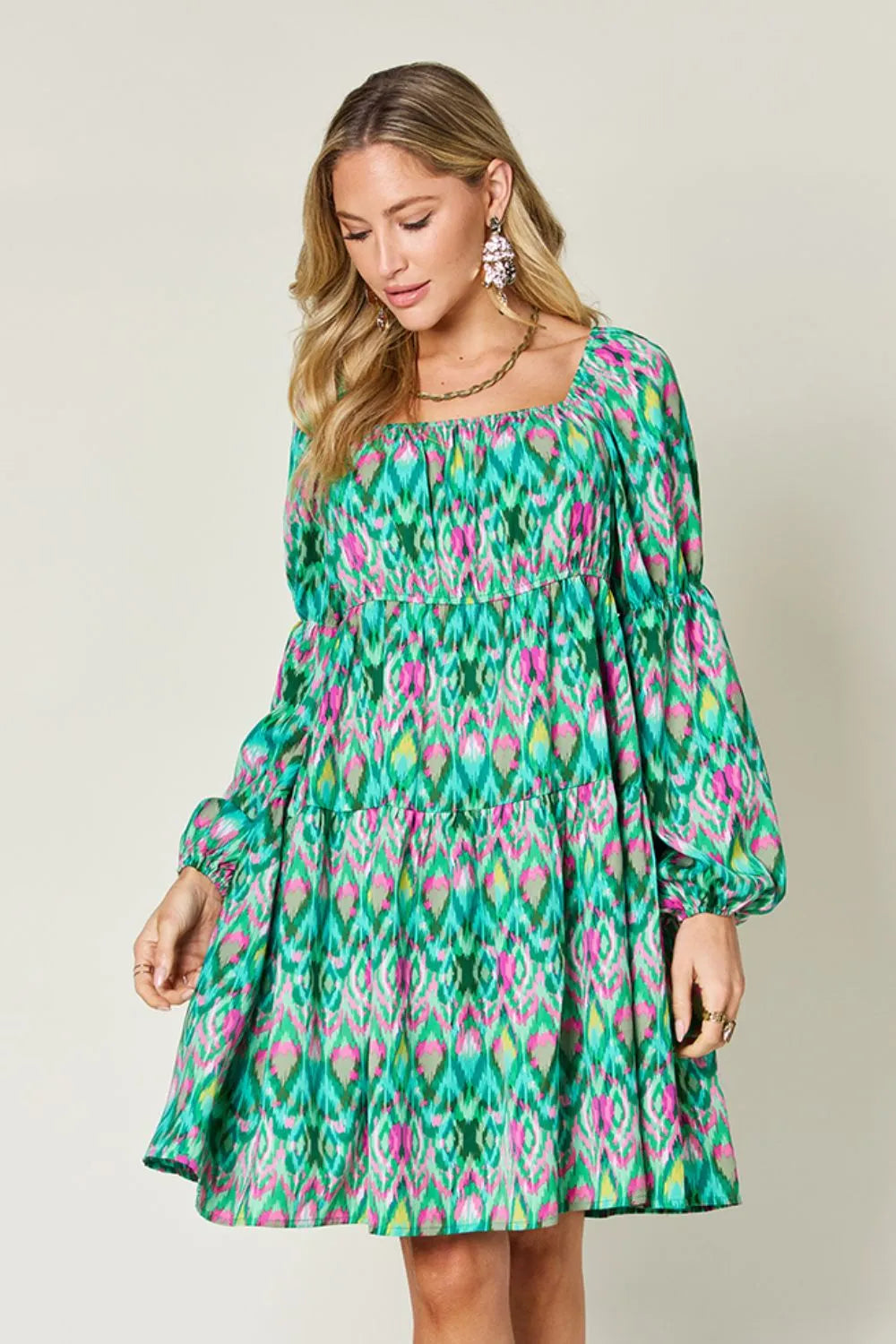 Printed long sleeve dress from Trendsi, Double Take full size, featuring a stylish design with a comfortable fit.