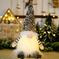 Sequin light-up faceless gnome from Trendsi with shiny sequins and a whimsical design, perfect for festive holiday decor.