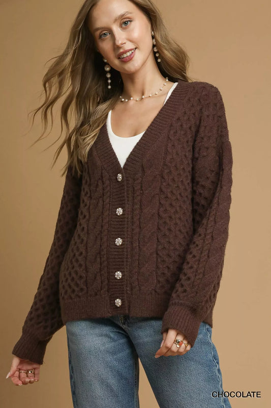 Umgee cable knit pearl button cardigan featuring a cozy design with pearl accents, perfect for layered fall and winter style.