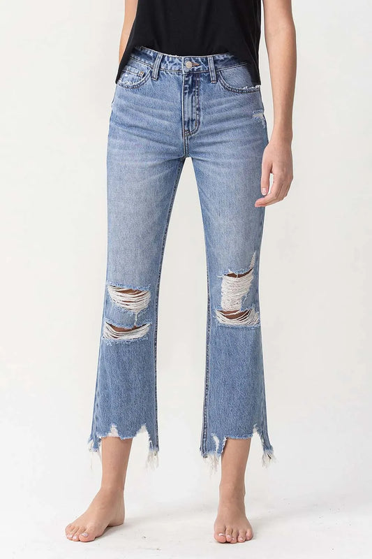 Lovervet high-rise distressed straight jeans by Trendsi, showcasing a fit with ripped details and classic denim wash.