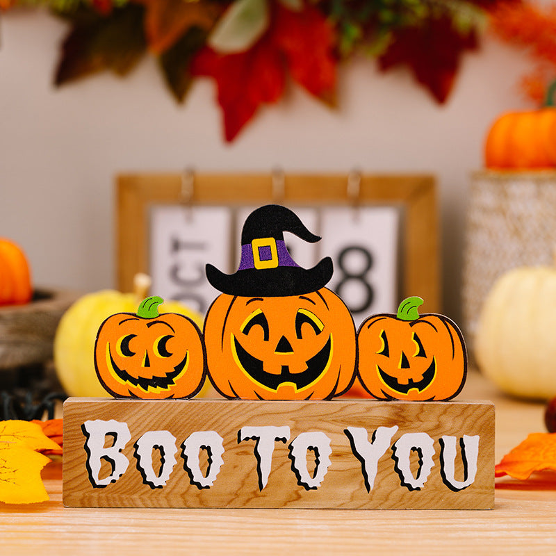 Assorted 2-piece Halloween element ornaments with spooky designs and orange and black accents, perfect for seasonal decor.