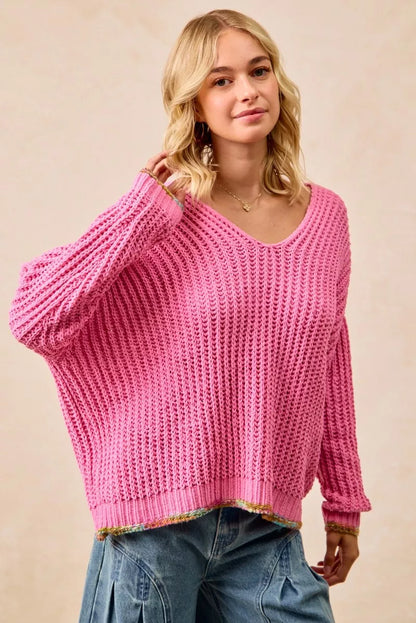 BiBi V-neck sweater by Trendsi featuring colorful trim and soft knit fabric, displayed on a mannequin.