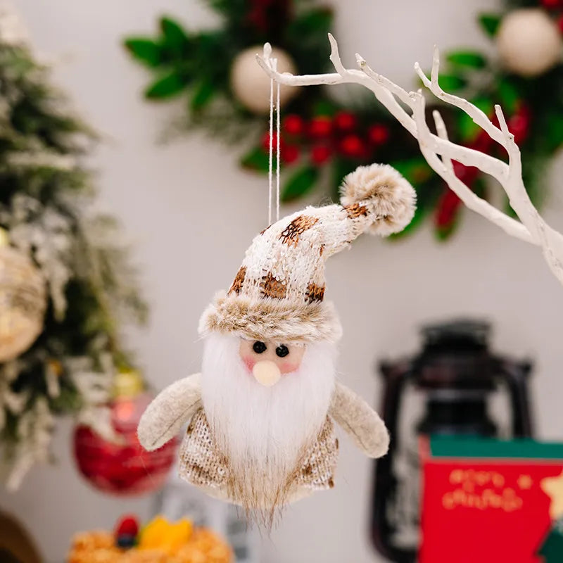 Hanging ornament featuring Santa, snowman, and reindeer design, perfect for holiday decor, by Trendsi.