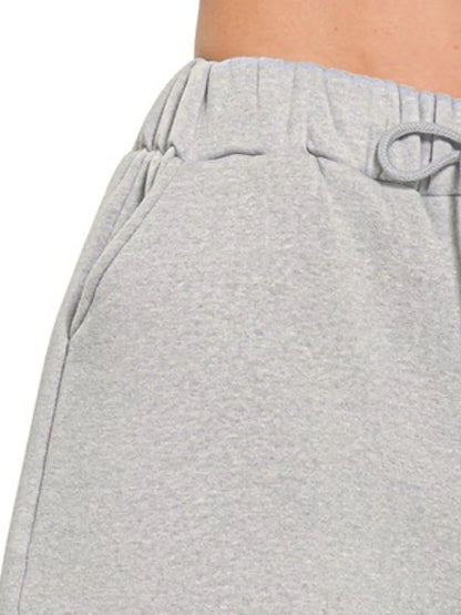 Comfortable Zenana fleece drawstring short pants with side pockets, perfect for casual wear and lounging.