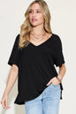 Basic Bae bamboo V-neck short sleeve T-shirt by Trendsi, featuring a slit design and casual fit in a natural, comfortable fabric.