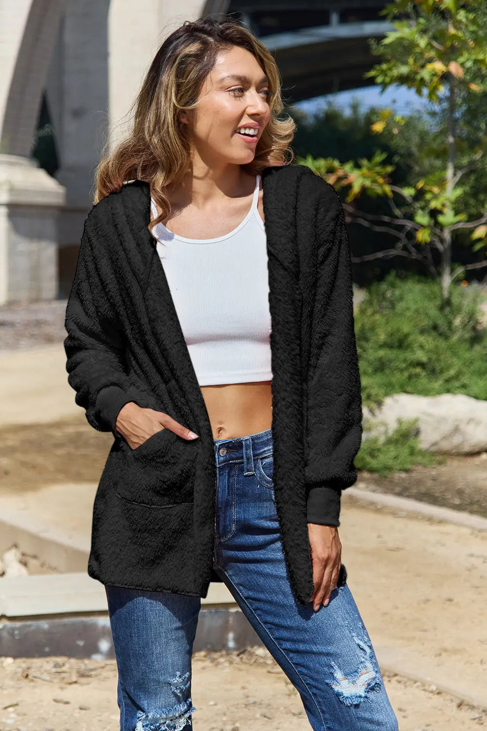 Full size Teddy hooded jacket with pockets from Trendsi, soft plush fabric, cozy hood, and functional front pockets.