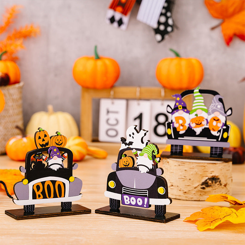 Three Halloween-themed car-shaped ornaments in orange, black, and white with spooky designs from Trendsi.