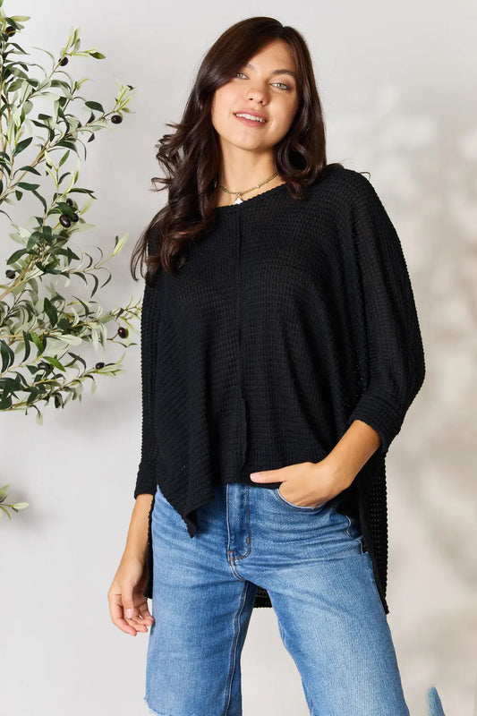 Zenana high-low slit knit top with round neck in a full size, featuring a stylish and comfortable design.