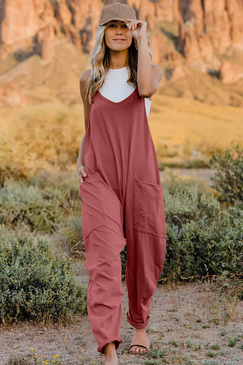 Double Take full-size sleeveless v-neck jumpsuit with pockets, stylish Trendsi women's summer outfit, black fabric, front view.