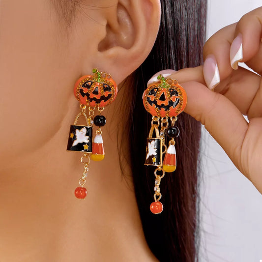 Halloween pumpkin drop earrings featuring orange pumpkin charms with black detailing, stylish jewelry by Trendsi.