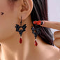 Gothic bat drop earrings with black bat-shaped design and dangling chain details, stylish jewelry by Trendsi