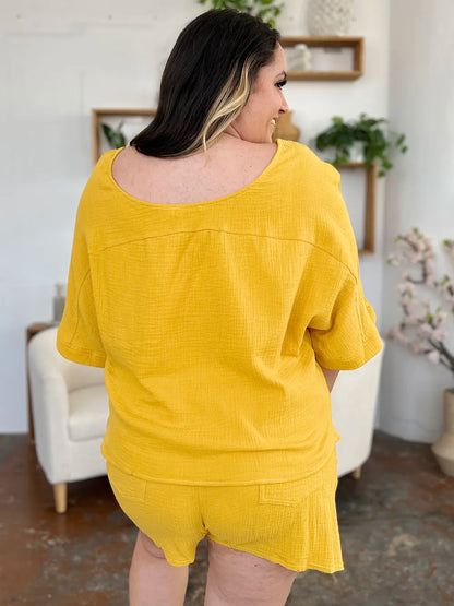 Trendsi Double Take Texture half sleeve T-shirt and drawstring shorts set, featuring a stylish, textured fabric in a casual outfit.
