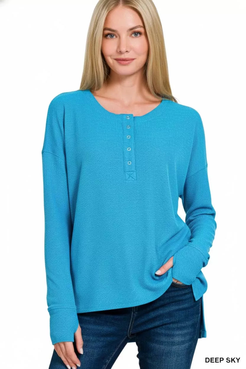 Zenana Waffle Thumb Hole Cuffs Henley Tee in neutral color featuring waffle fabric, thumb hole cuffs, and a classic henley neckline.