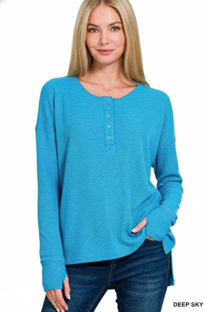 Zenana Waffle Thumb Hole Cuffs Henley Tee in neutral color featuring waffle fabric, thumb hole cuffs, and a classic henley neckline.