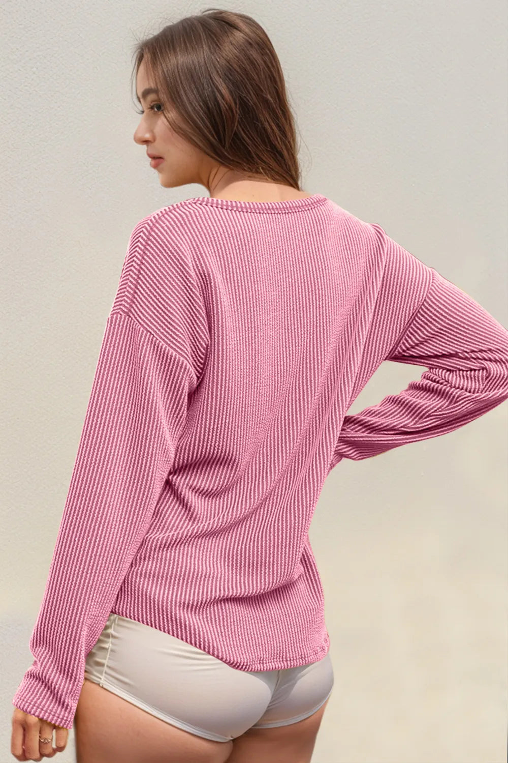 Striped long sleeve T-shirt with notched neckline from Trendsi's Double Take collection, featuring a stylish casual fit.