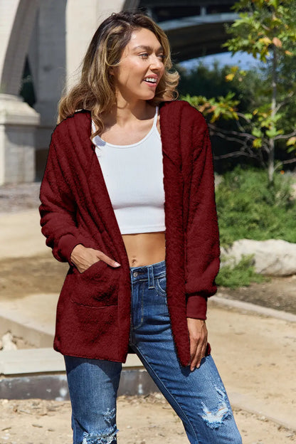 Full size Teddy hooded jacket with pockets from Trendsi, featuring a soft plush fabric and cozy hood for casual wear.