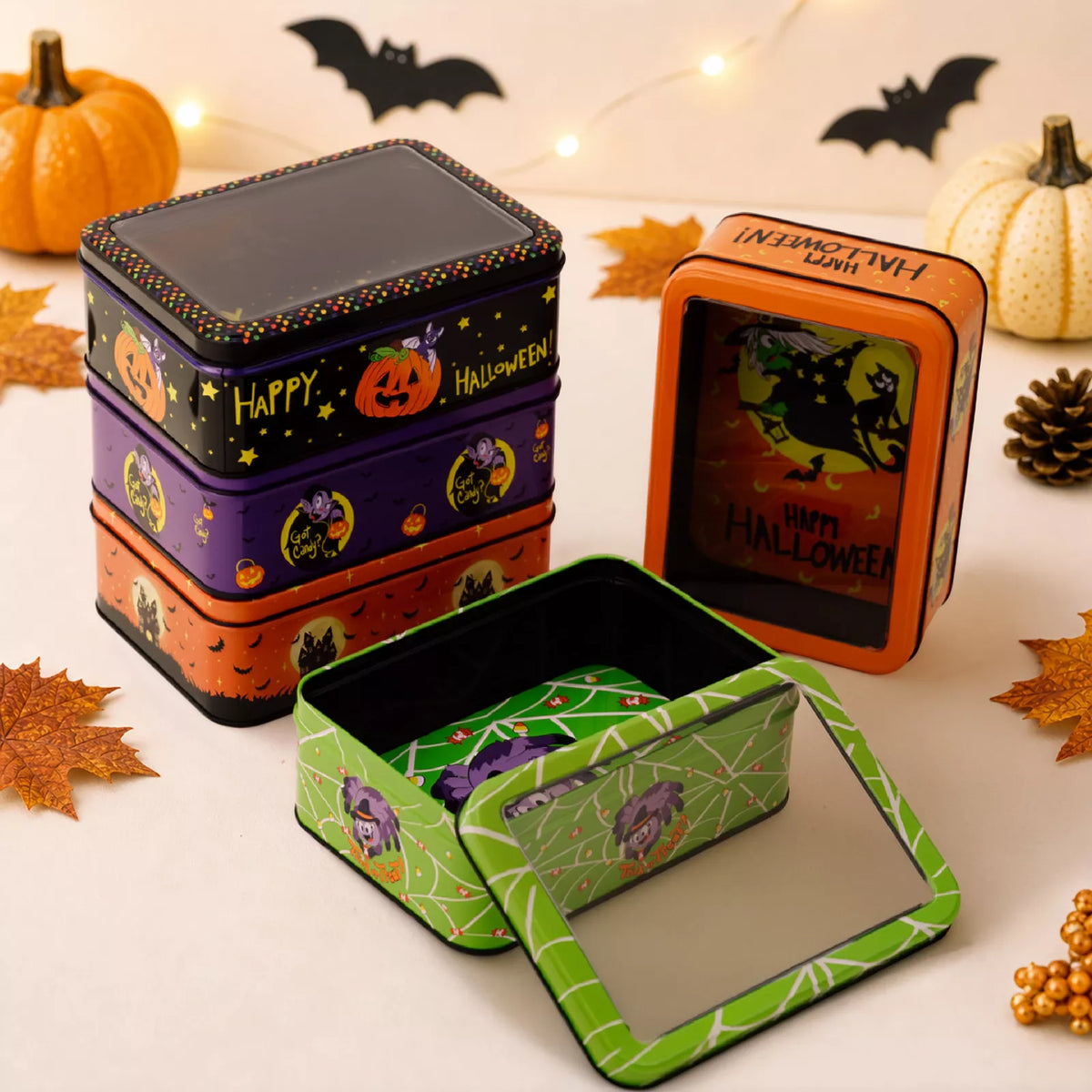 Halloween decorative metal storage box with window display, featuring a spooky design and vintage metal finish.
