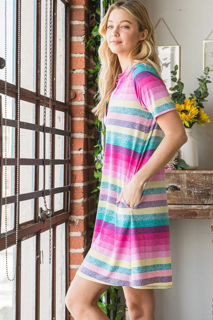 Heimish full size striped short sleeve mini tee dress by Trendsi, featuring a casual fit and colorful horizontal stripes.