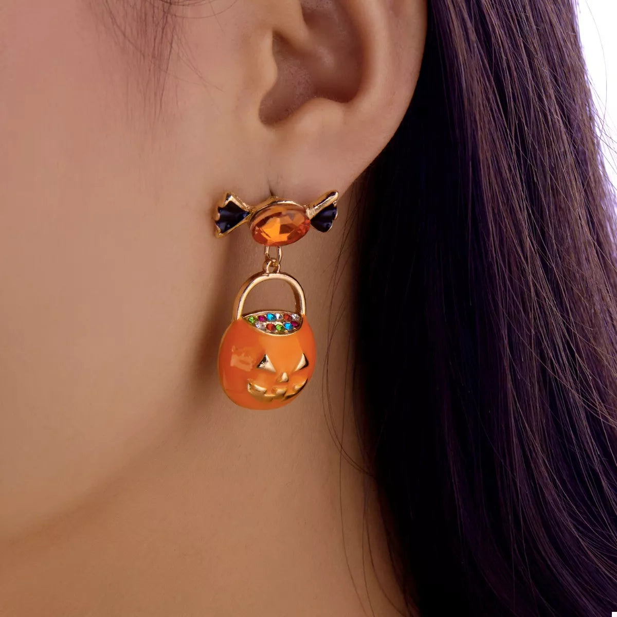 Halloween rhinestone pumpkin dangle earrings with sparkling pumpkin design, stylish jewelry by Trendsi