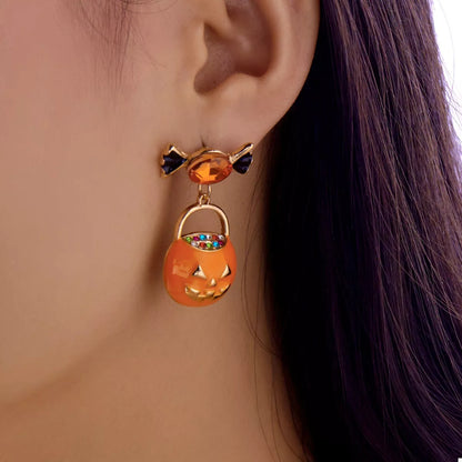 Halloween rhinestone pumpkin dangle earrings with sparkling pumpkin design, stylish jewelry by Trendsi
