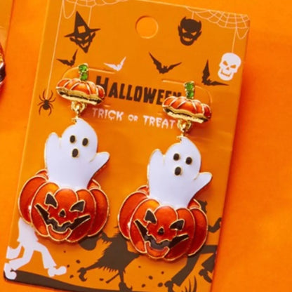 Halloween ghost and pumpkin dangle earrings by Trendsi featuring spooky ghost and pumpkin charms on silver hooks
